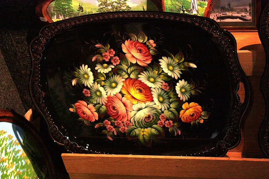 Carved red lacquerware with traditional motifs